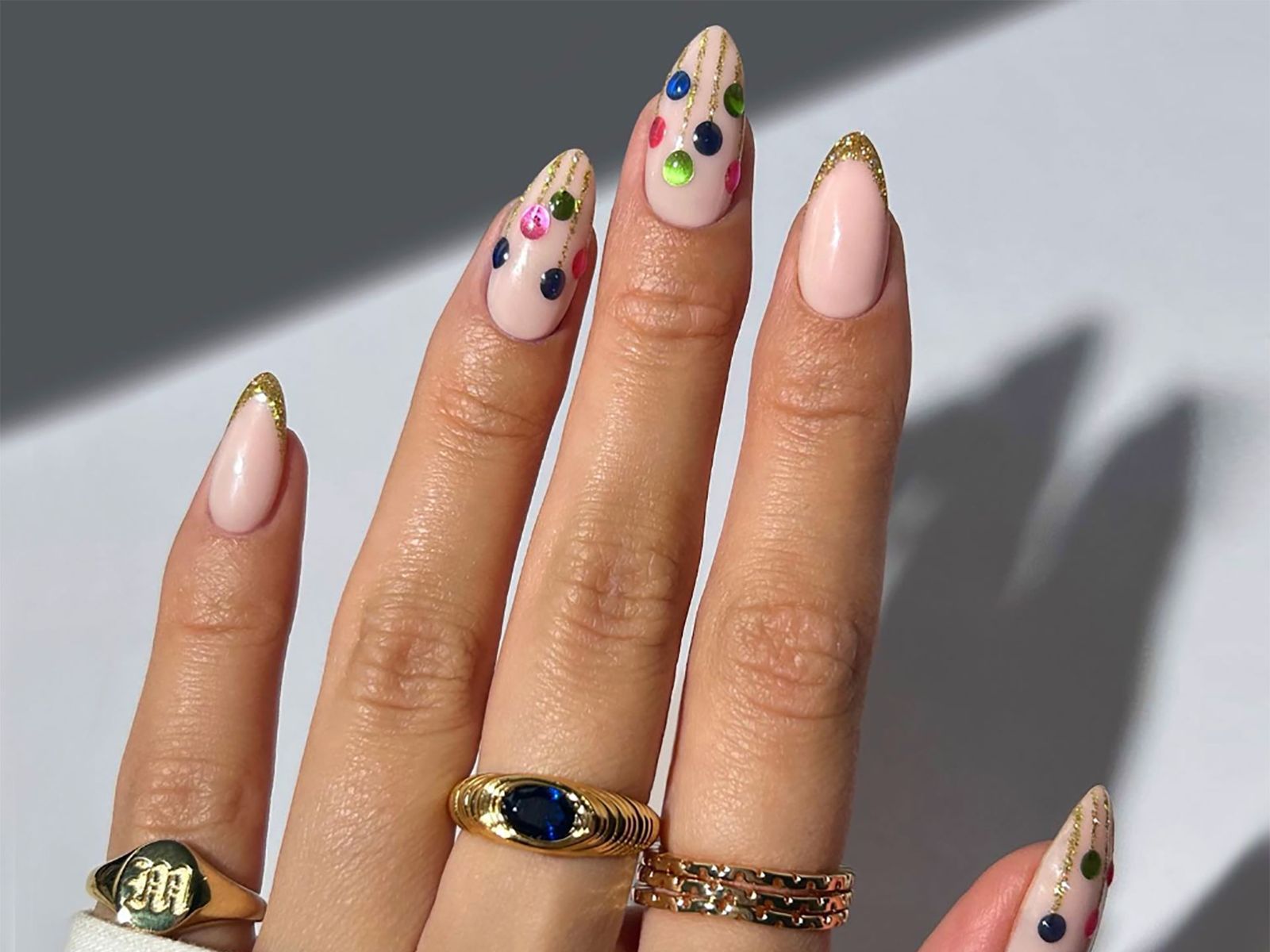 These Christmas bauble nail designs will shine throughout December