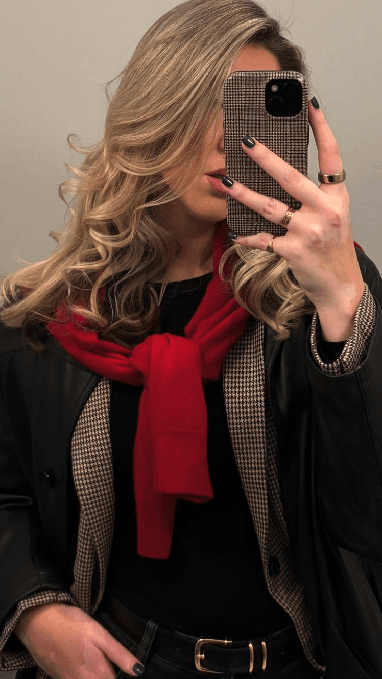 Image may contain Blazer Clothing Coat Jacket Blonde Hair Person Adult and Photography